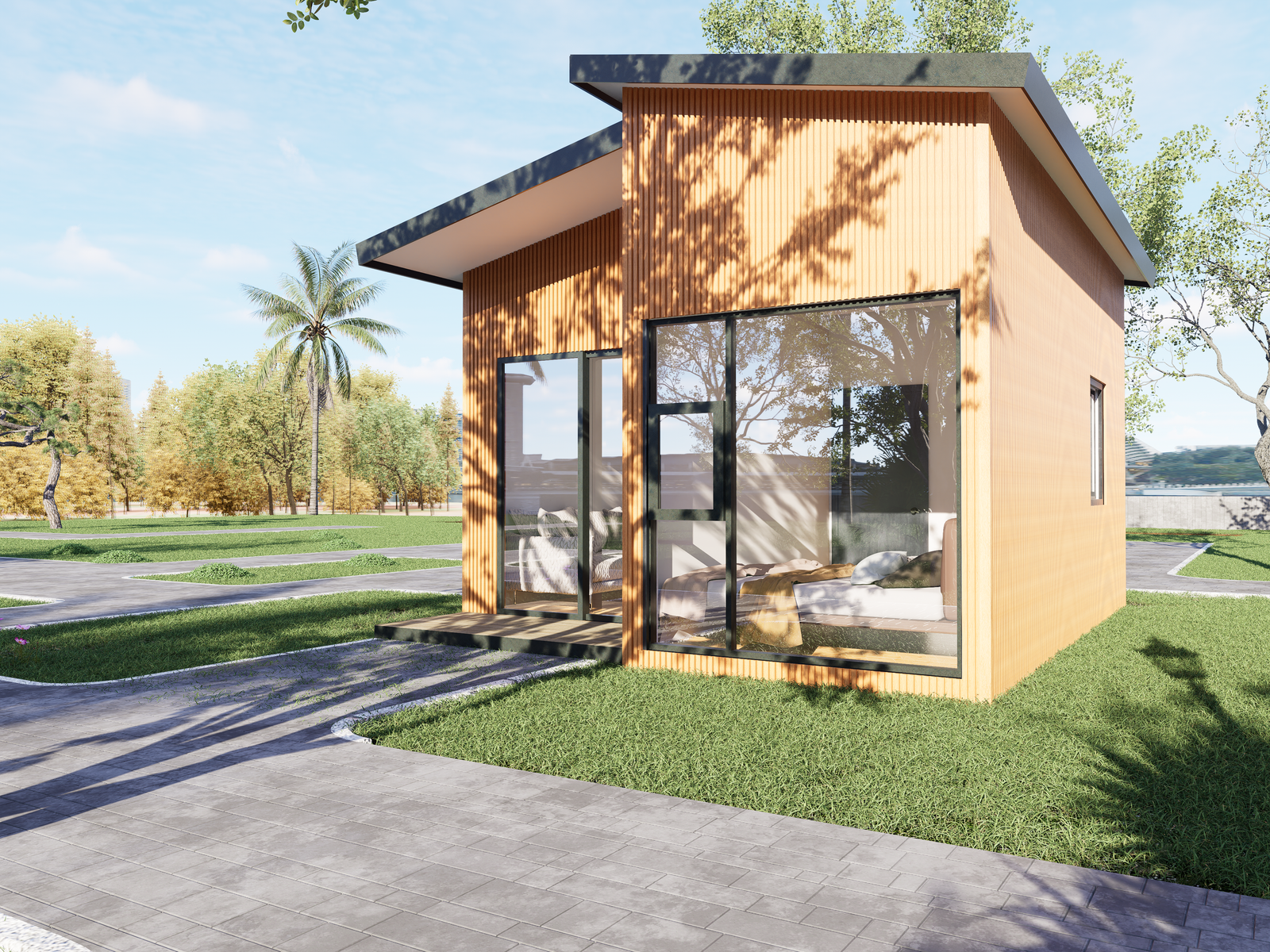 Compact PLAD accessory dwelling unit with cedar siding and floor-to-ceiling windows on a lakeside lot